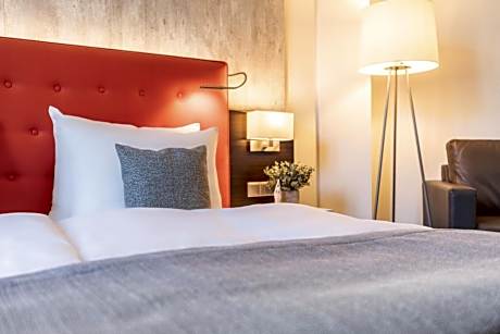 Standard Family Room with One Queen Bed and One Sofa Bed