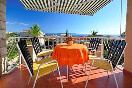 One-Bedroom Apartment with Balcony and Sea View