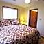 Peach Tree Inn & Suites