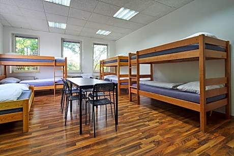 Eight-bed room with shared bathroom