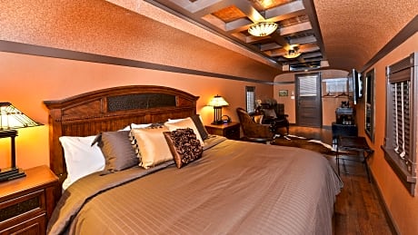 Suite-1 King Bed  Non-Smoking Rail Car Room Spa Tub Heated Flooring Deluxe Furnishings Separate Show