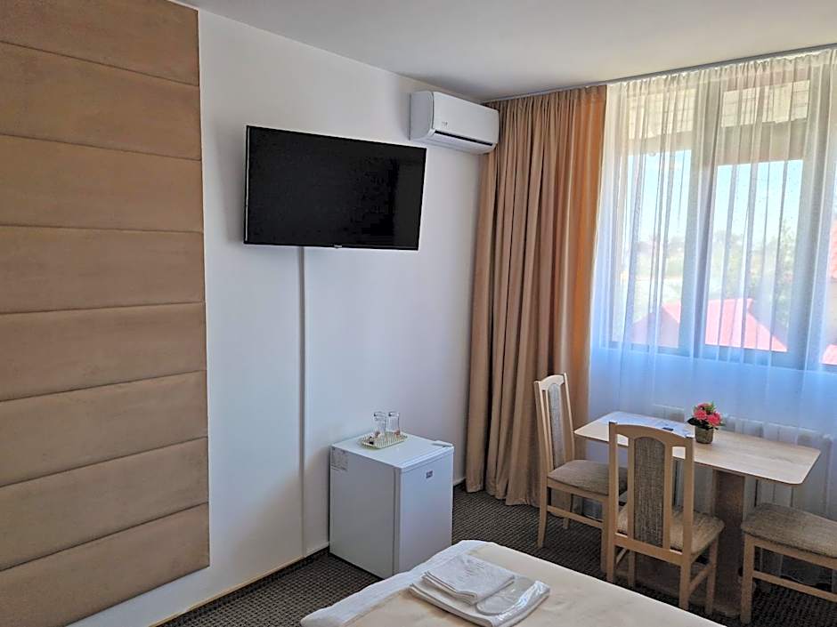 Photo 1 of 16 of Triple Room with Private Bathroom