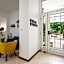 Yellow house with private parking
