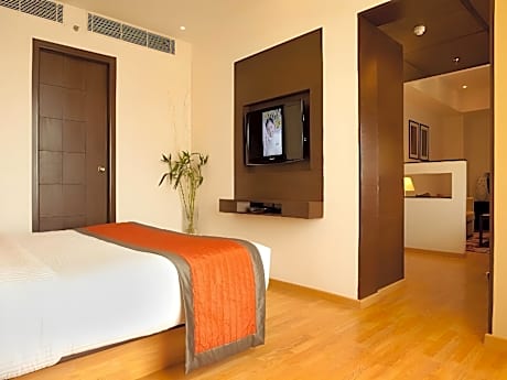 Executive Suite with 15% Off on F&B, 02 pcs laundry, High tea with snacks, Happy Hours 1+1 IMFL, 02 Glass of Beer OR 2 - 30ml IMFL liquor & Late Check-Out by 02 hours Subject to availability