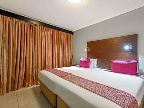 Superior Room with Balcony, One King and Two Single Beds