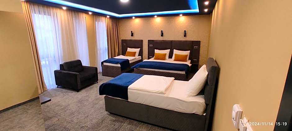 Photo 1 of 10 of Quadruple Room