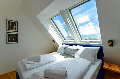 One-Bedroom Apartment with Balcony and City View