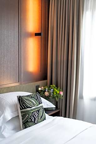 Homage Suite with a king size bed - garden view