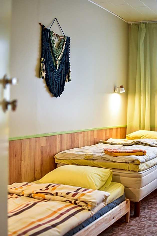 Photo 1 sur 5 de Quadruple Room with Shared Bathroom