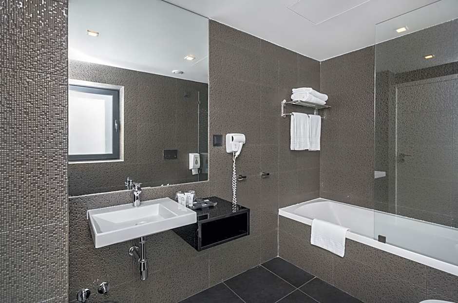 Essence Inn Marianos Hotel