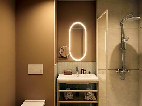 Privilege Room with a double bed and a sofa