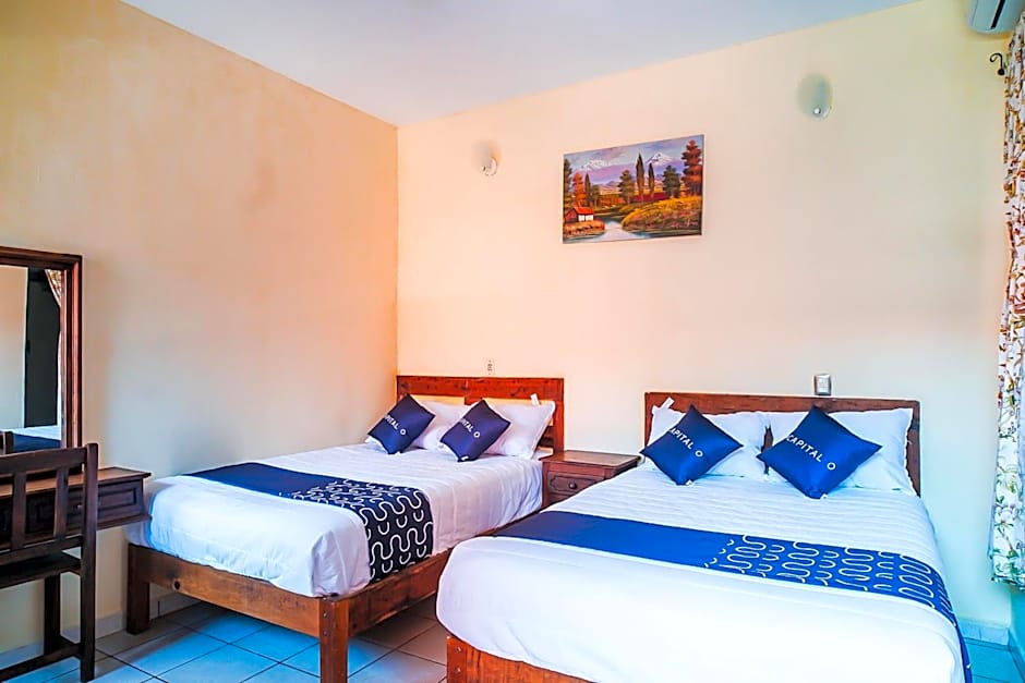 Capital O Hotel Aurora