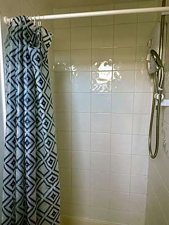 Single Bed in Dormitory Room