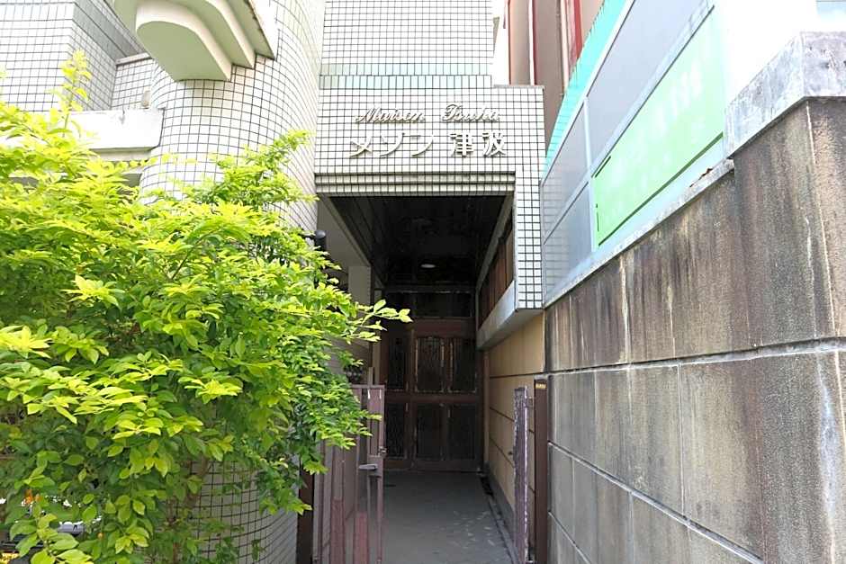 Mezon Tsuha