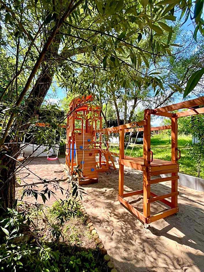 Pustelnia Supraśl - domki nad rzeką