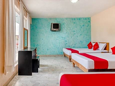 Capital O Hotel La Siesta