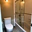 A cozy bedroom with a private washroom close to YVR Richmond