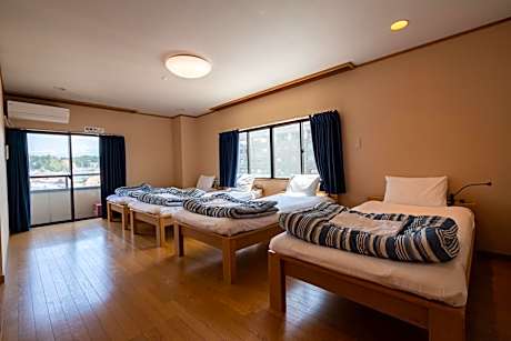 Quadruple Room with Shared Bathroom