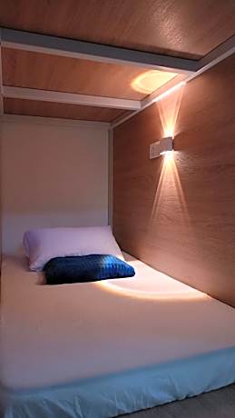 Single Bed in Dormitory Room