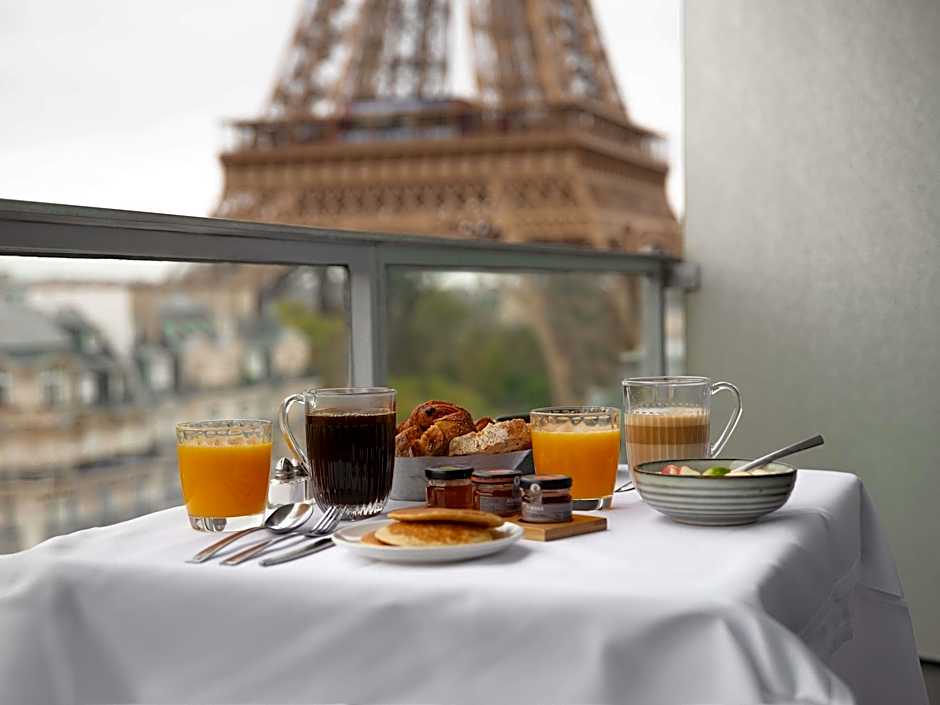 Photo 1 of 11 of Deluxe 1 King Bed with Sofabed, Eiffel Tower View, Balcony