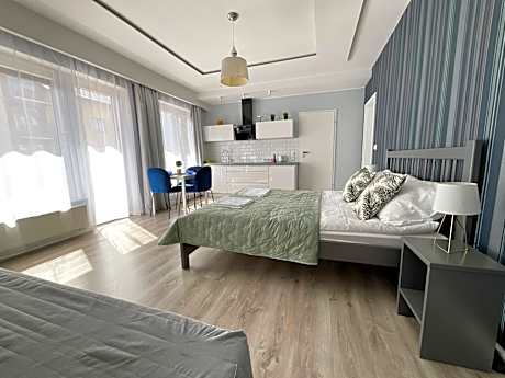 Deluxe Quadruple Room with Kitchenette