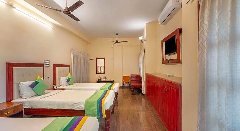 Treebo Grace Inn, 3 Min Walk From Promenade Beach