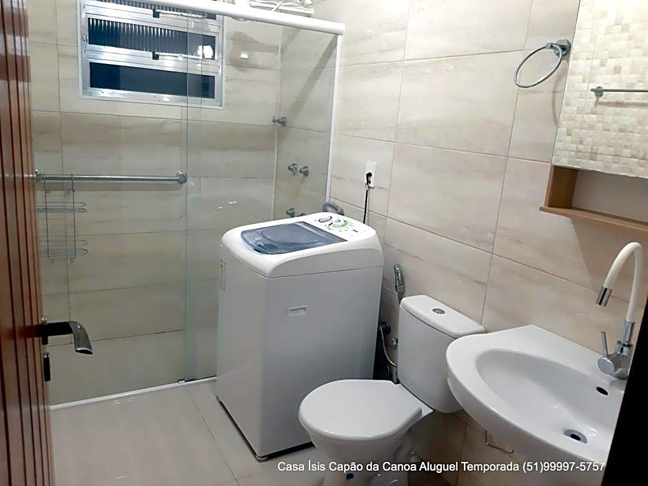 Casa ÍSIS de aluguel por temporada em Capão da Canoa com piscina