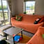 Award winning Serenity Lodge with outstanding lakeside views from the hot tub , at Tallington Lakes Leisure Park, Stamford