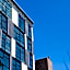 Dharma Home Suites Hoboken at Novia