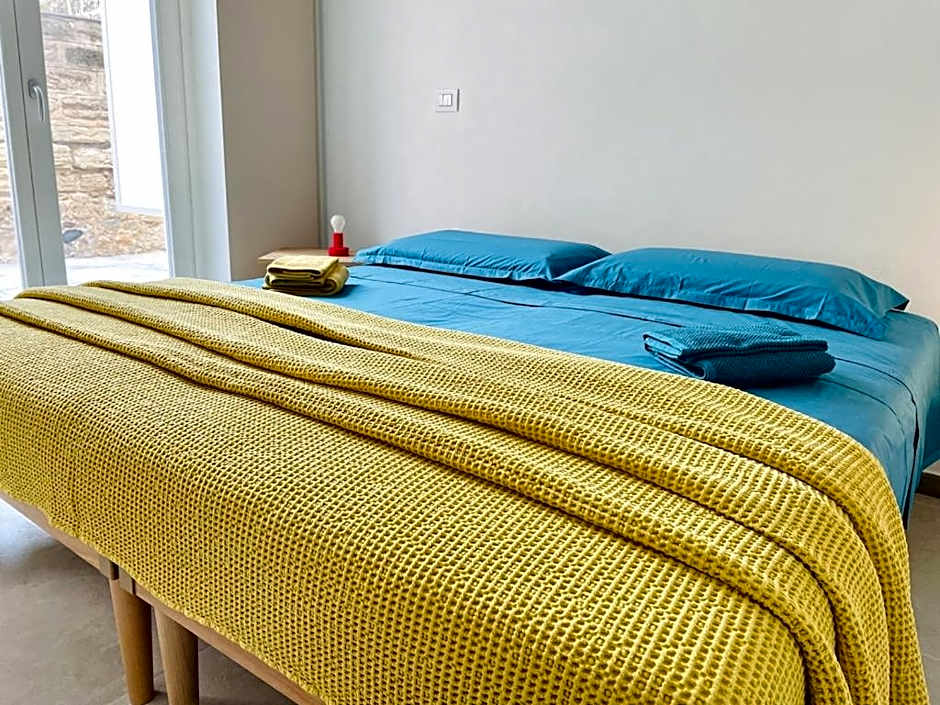 ClickSardinia Alghero Spectacular waterfront Neptune apartment with sea-facing terraces and garden