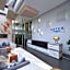 Aster Hotel and Residence by At Mind