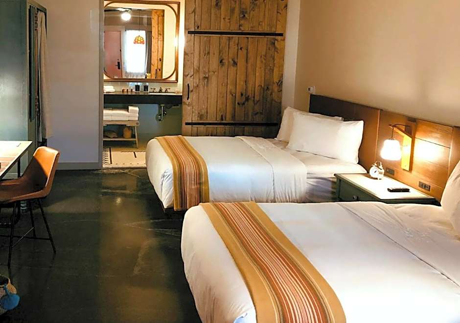 Texican Court, by Valencia Hotel Group