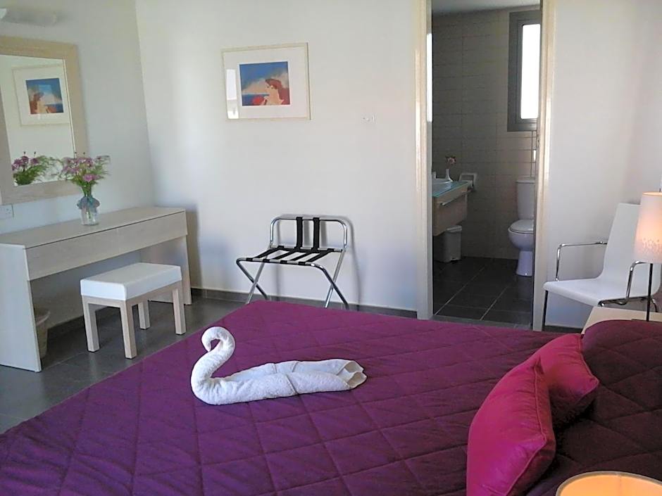 Natura Beach Hotel And Villas