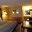 APM Inn and Suites