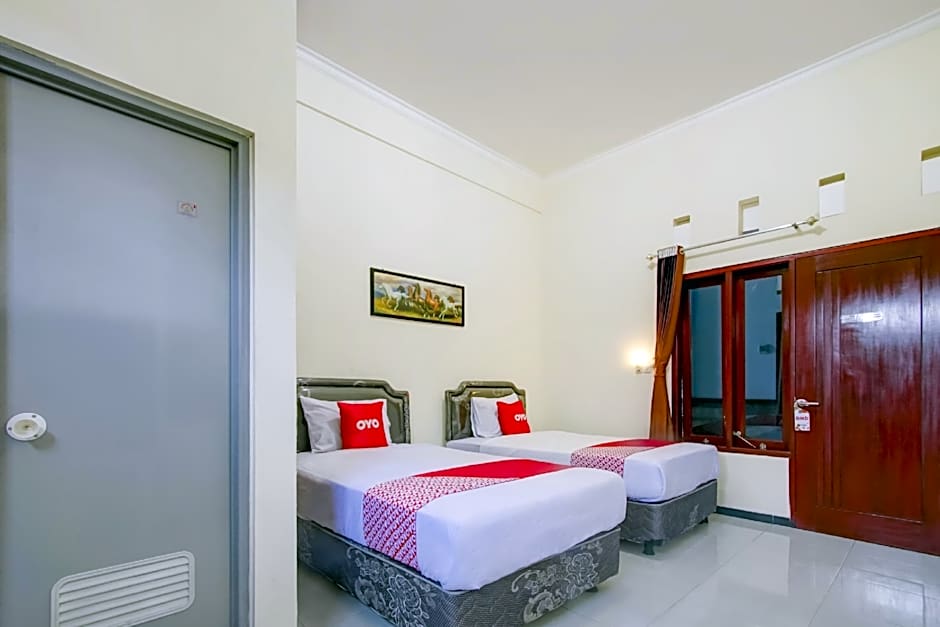 Capital O 90151 Guest House 180