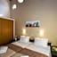 Theos Village Apartments