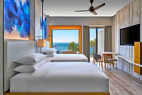 Deluxe Double Room with Two Double Beds and Partial Ocean View