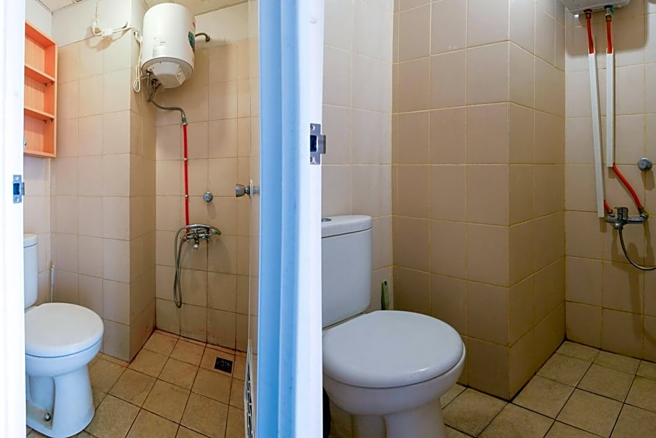 Vaccinated Staff - OYO 2582 Apartemen Serpong Green View