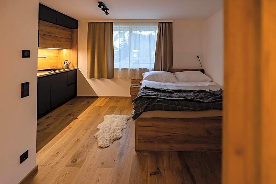 RIVERSIDE RAURIS APARTMENTS