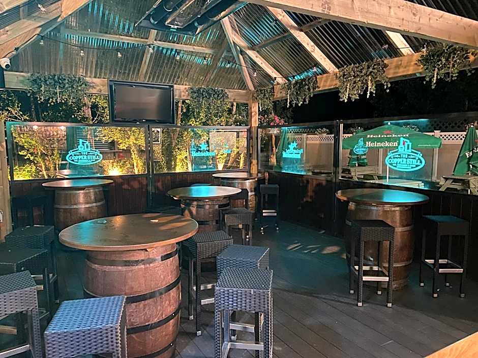 The Copper Still Bar Restaurant & Boutique Rooms
