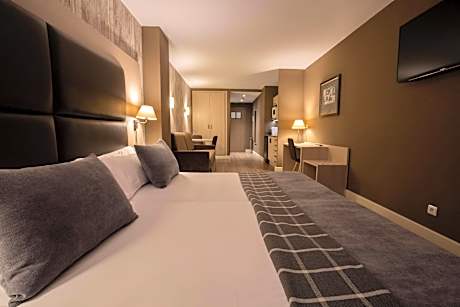 Quadruple Room (3 Adults + 1 Child)