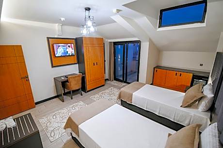 Quadruple Room with Balcony