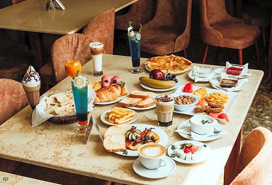 Turquoise Pyramids & Grand Egyptian museum view Hotel