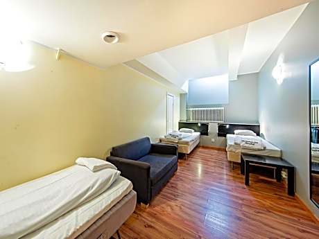 Quadruple Room with Shared Bathroom (No Window)