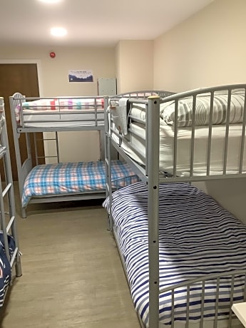 Single Bed in Dormitory Room