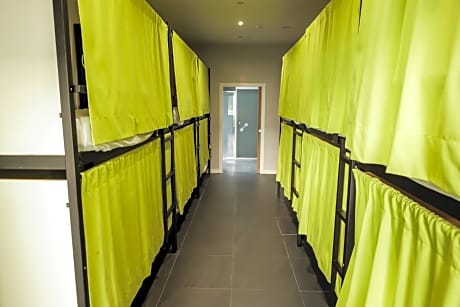 Bed in shared dormitory