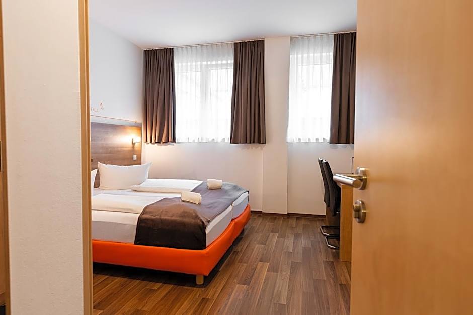 Orange Hotel und Apartments
