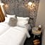Happy Inn Rooms & Suites