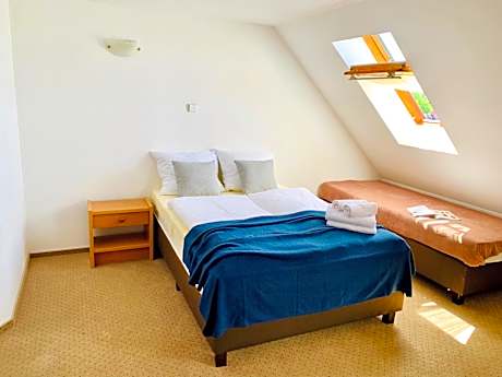 Quadruple Room with Private Bathroom