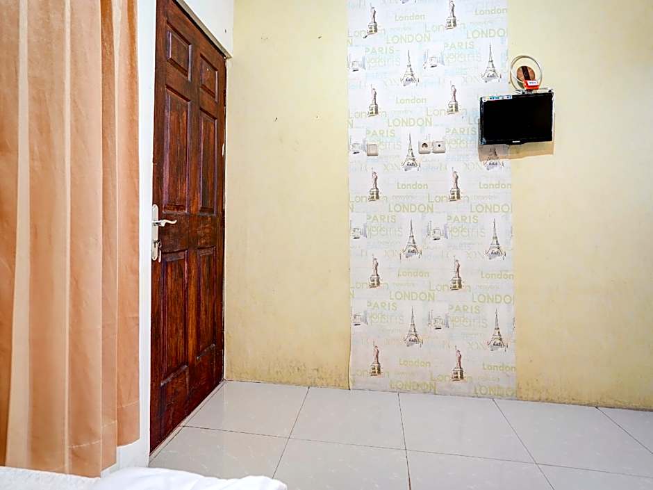 OYO Life 90606 Glass House Citraland Syariah